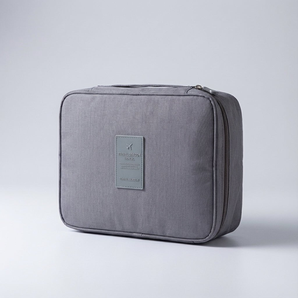 Compact makeup bag featuring waterproof fabric and multiple compartments for organized storage of cosmetics and beauty essentials. 7