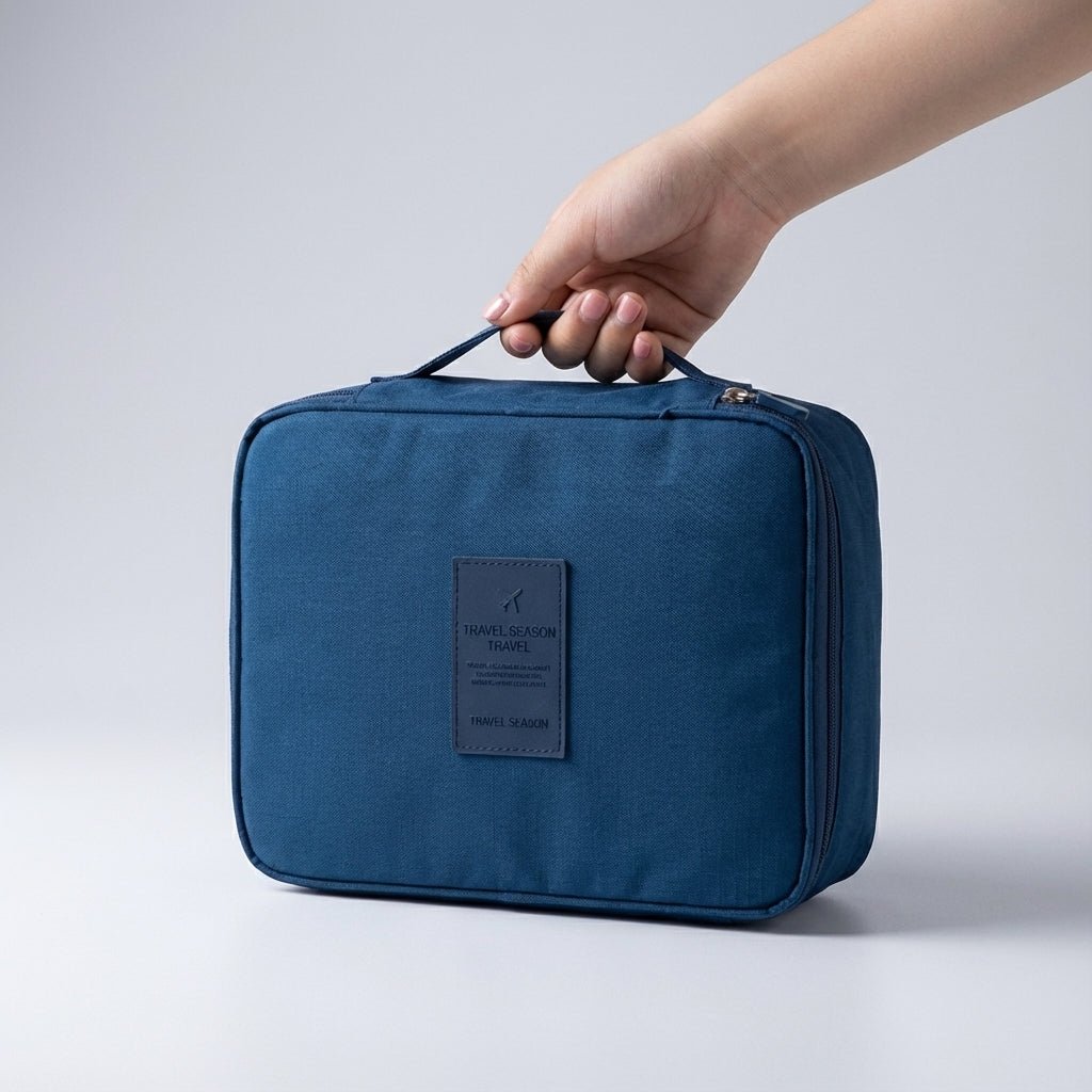 Compact makeup bag featuring waterproof fabric and multiple compartments for organized storage of cosmetics and beauty essentials. 5