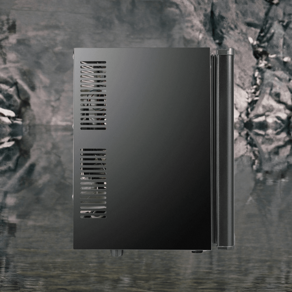 Compact mini fridge with auto-defrost feature, designed for bedrooms, showcasing a sleek black solid door, perfect for storing beverages and snacks. 2
