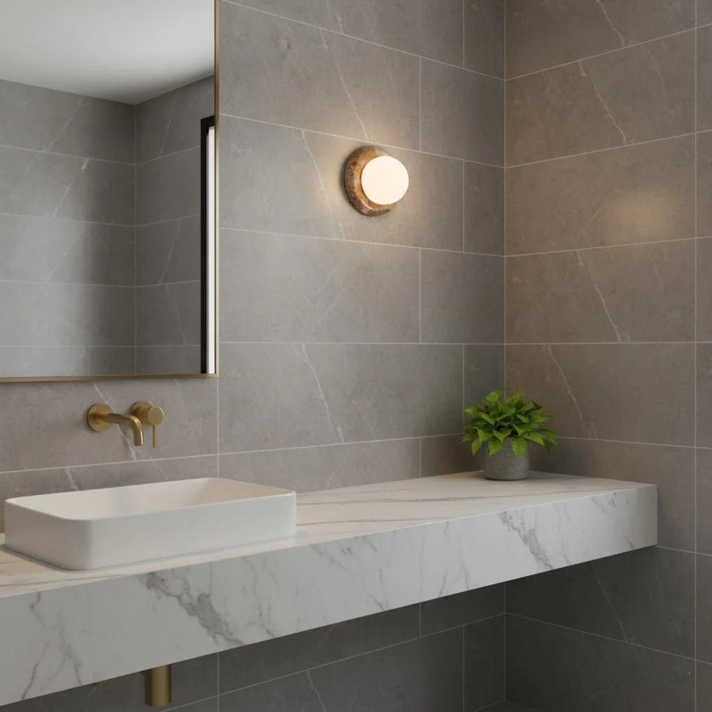 Compact Onyx Wall Light featuring a sleek design with a soft white glass diffuser, ideal for creating ambient lighting; dimmable hardwired fixture perfect for 14