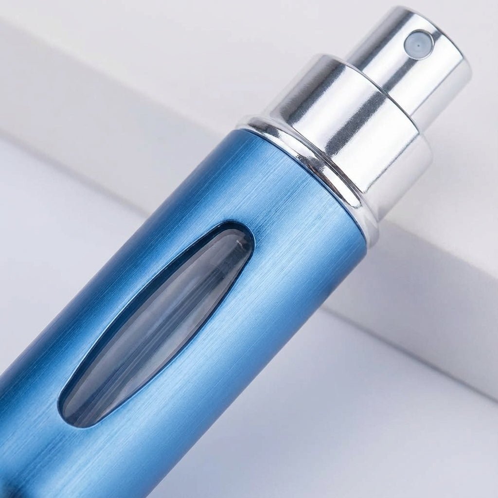 Compact refillable perfume atomizer set of 4 in sleek aluminum design, featuring leak-resistant pumps and a travel-friendly size of 5ml each, 3