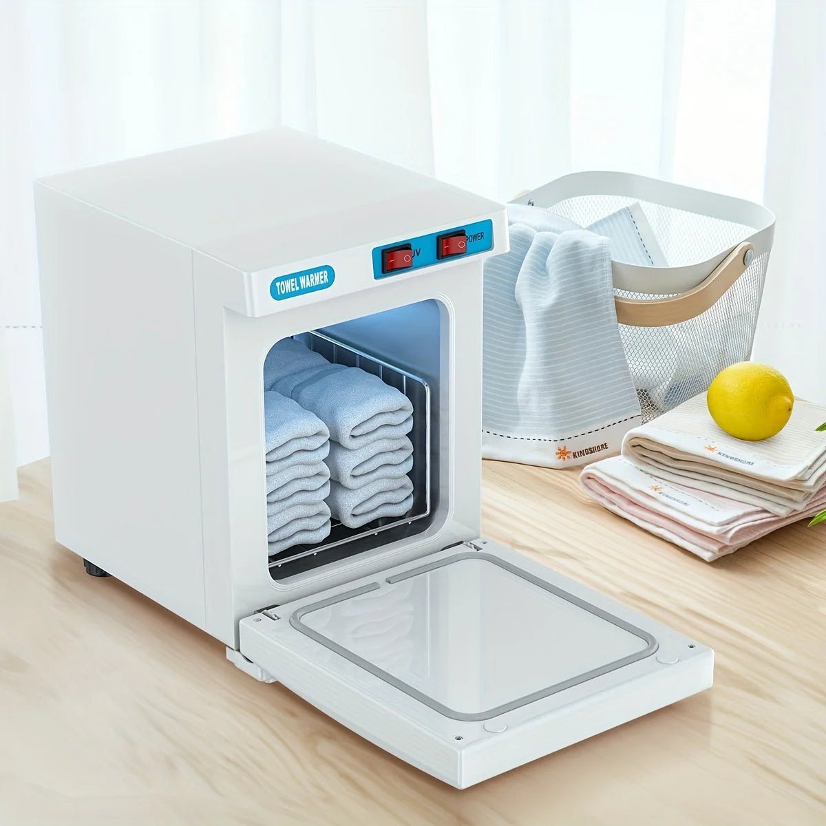 Compact towel warmer cabinet with UV function and stainless steel basket, featuring a 5L capacity, perfect for home or salon use. 1