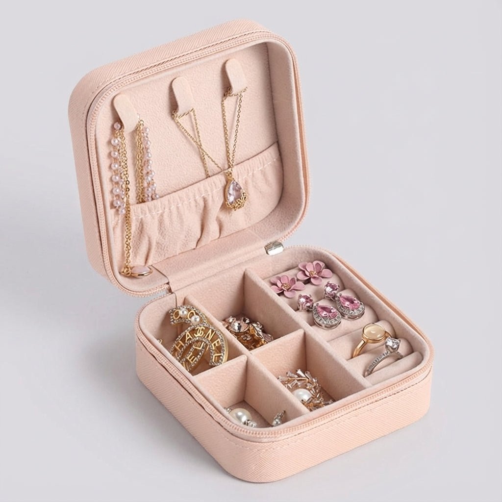 Compact travel jewelry box featuring a soft leather finish, designed for lightweight portability and protective storage of jewelry items. 4