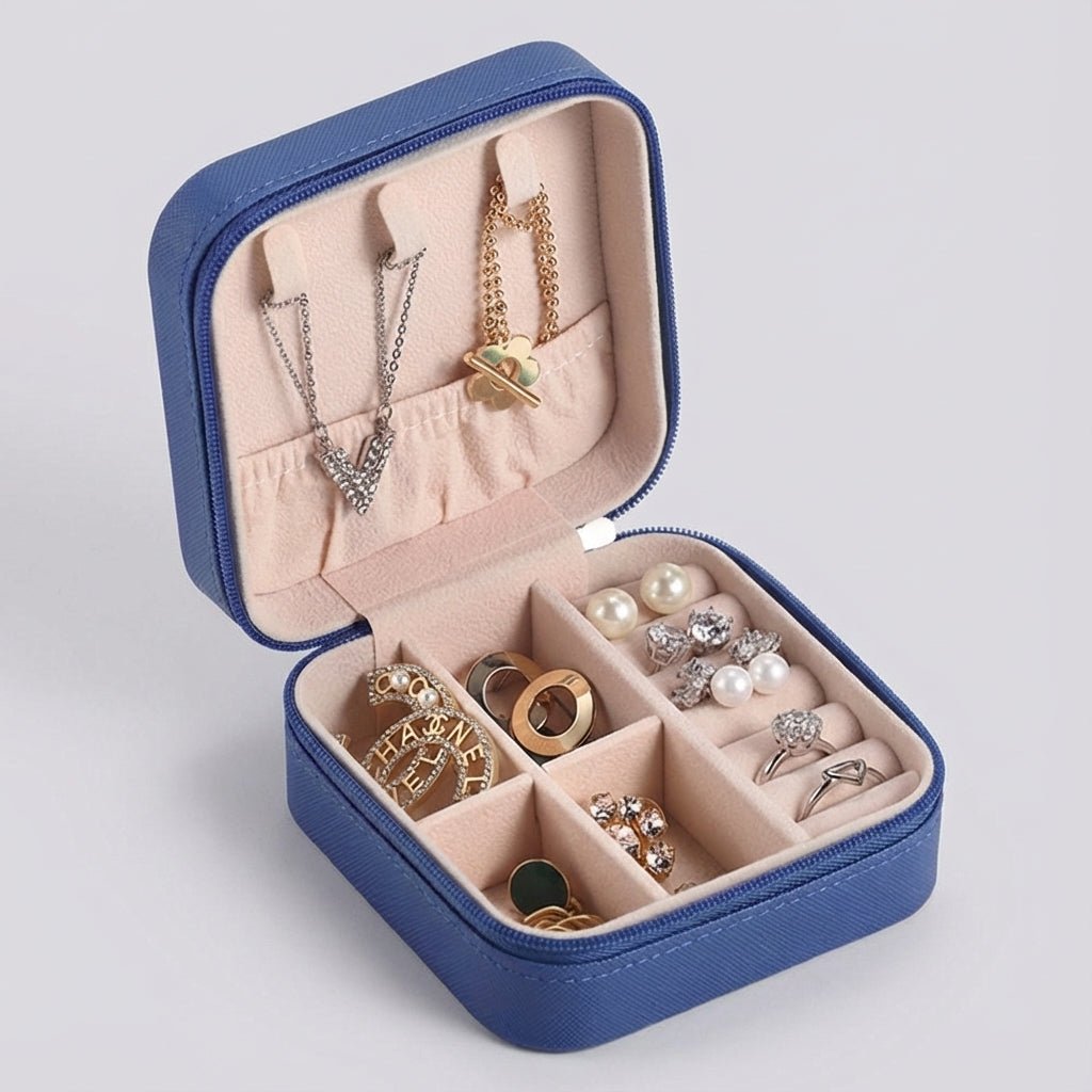 Compact travel jewelry box featuring a soft leather finish, designed for lightweight portability and protective storage of jewelry items. 5