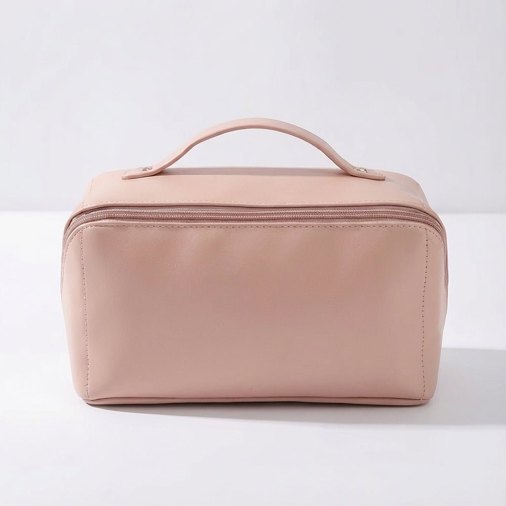 Compact travel makeup bag featuring multiple compartments and a sturdy handle, designed for organizing beauty essentials in a glossy cosmetic pouch. 5