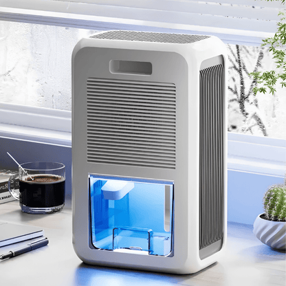 Compact USB dehumidifier for bedroom, featuring a sleek white design, ideal for moisture control in small spaces, operates quietly for comfortable use. 2