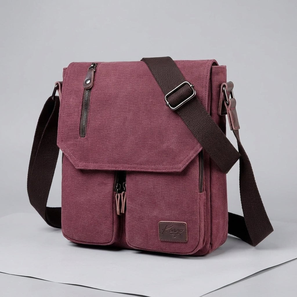 Compact vintage messenger bag made of durable canvas and PU leather, featuring an adjustable strap and a secure anti-theft pocket for added safety and style. 2