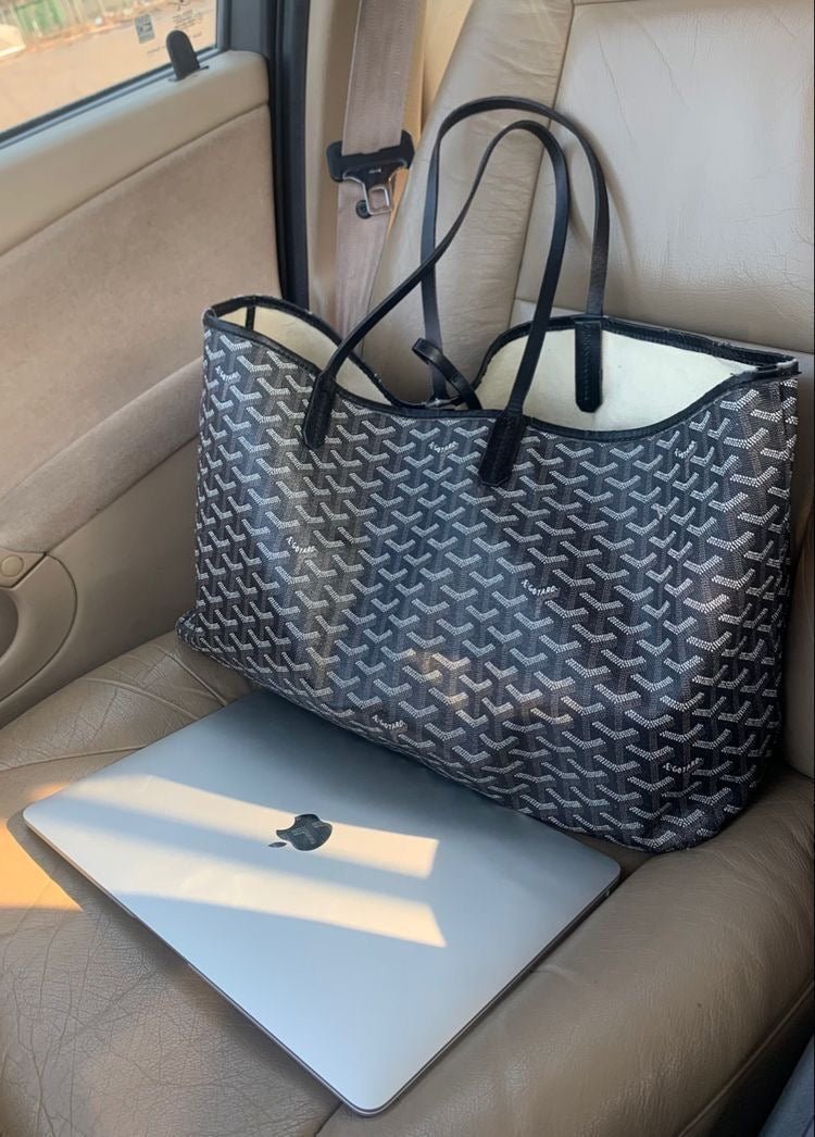 Contemporary handbag featuring clean lines and an adjustable strap, crafted from chic synthetic leather, ideal for both business and evening occasions. 5