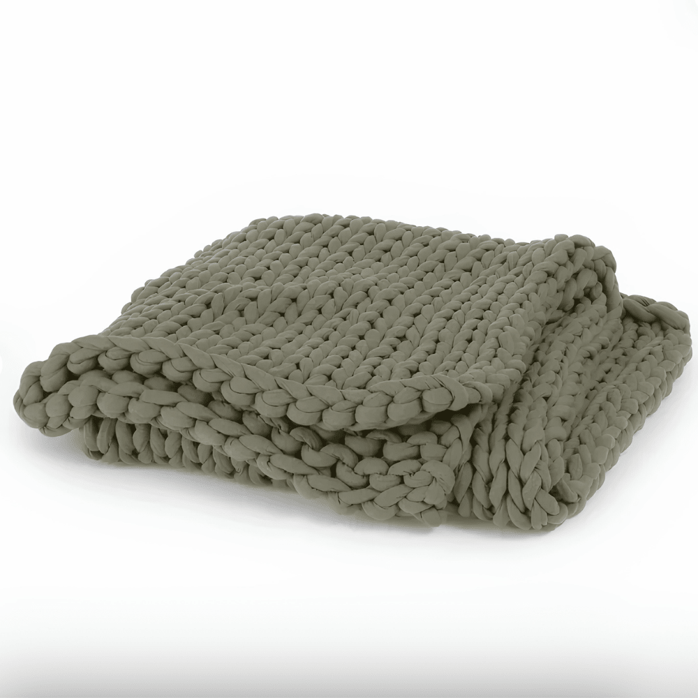 Cooling weighted blanket featuring a knit chunky design, made from breathable TENCEL™ fabric, available in various colors for enhanced comfort and style. 1