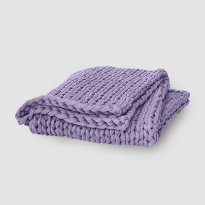 Cooling weighted blanket featuring a knit chunky design, made from breathable TENCEL™ fabric, available in various colors for enhanced comfort and style. 0