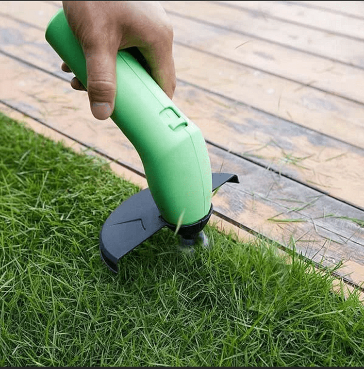 Cordless grass trimmer featuring an adjustable length, powerful motor, and lightweight compact design for precise lawn care. 2