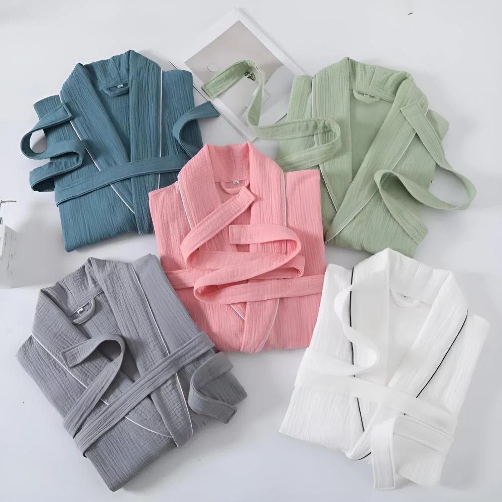 Cotton bathrobe for women with short sleeves, featuring a relaxed fit in double muslin fabric, designed for breathability and lightweight comfort. 3