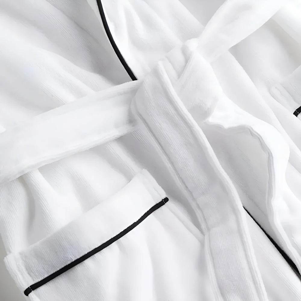 Cotton bathrobe for women with short sleeves, featuring a relaxed fit in double muslin fabric, designed for breathability and lightweight comfort. 6