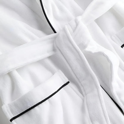 Cotton bathrobe for women with short sleeves, featuring a relaxed fit in double muslin fabric, designed for breathability and lightweight comfort. 6