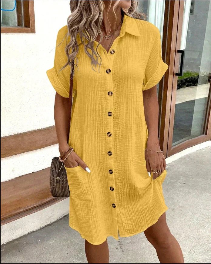 Cotton shirt dress featuring full-length button closure and turned-up sleeves, perfect for casual summer outings, knee-length design in a stylish and comfortable fit. 1