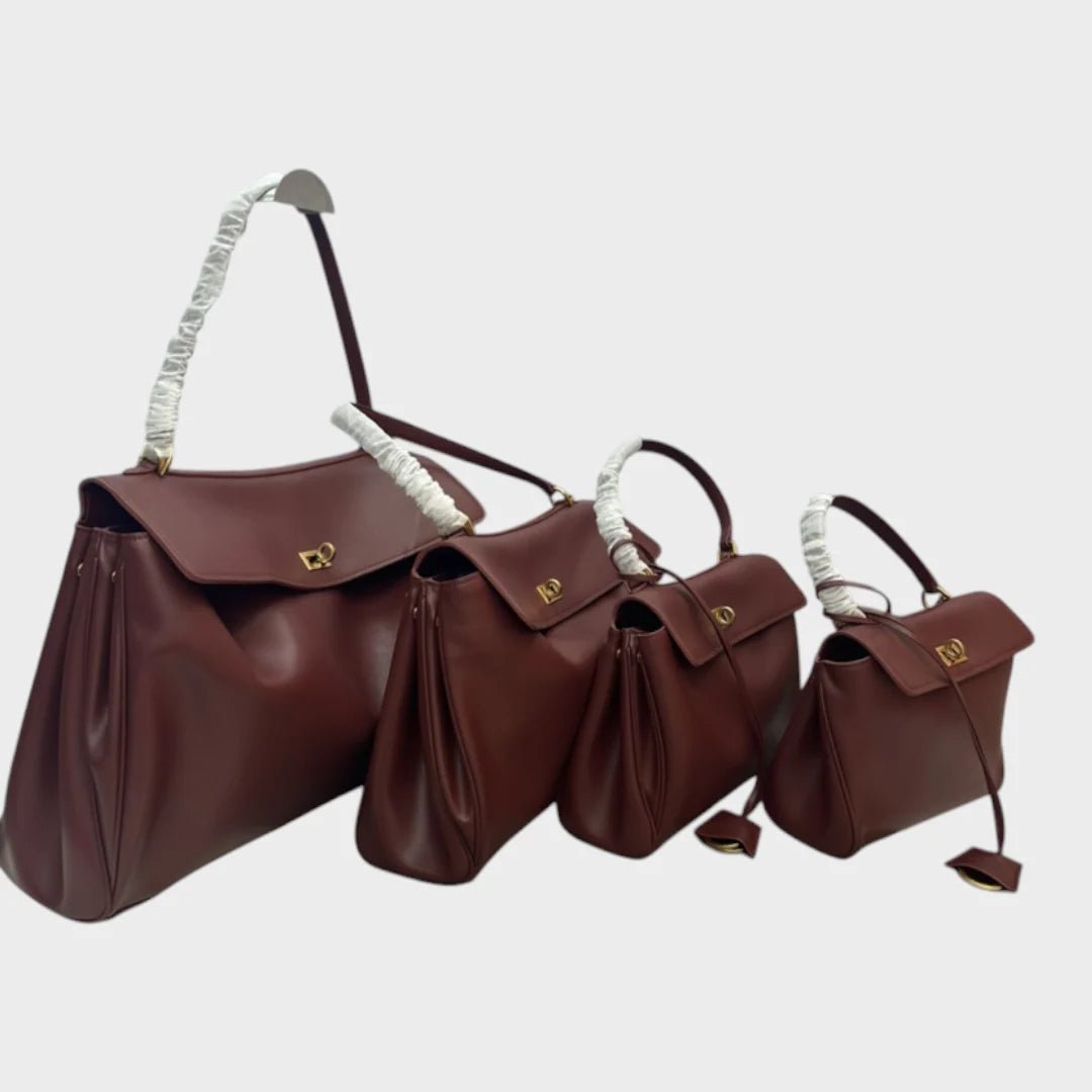 Cowhide leather shoulder bag featuring a magnetic flap closure, adjustable strap, and a lined interior for organized storage. 5