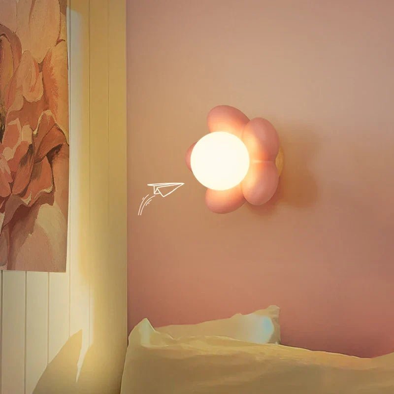 Cream wall lamp featuring a delicate floral design, emitting soft LED light perfect for elegant wall sconce lighting in any decor. 2
