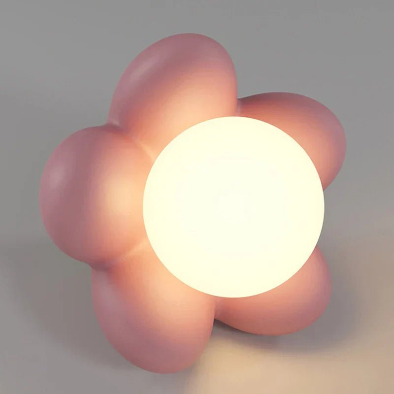 Cream wall lamp featuring a delicate floral design, emitting soft LED light perfect for elegant wall sconce lighting in any decor. 1