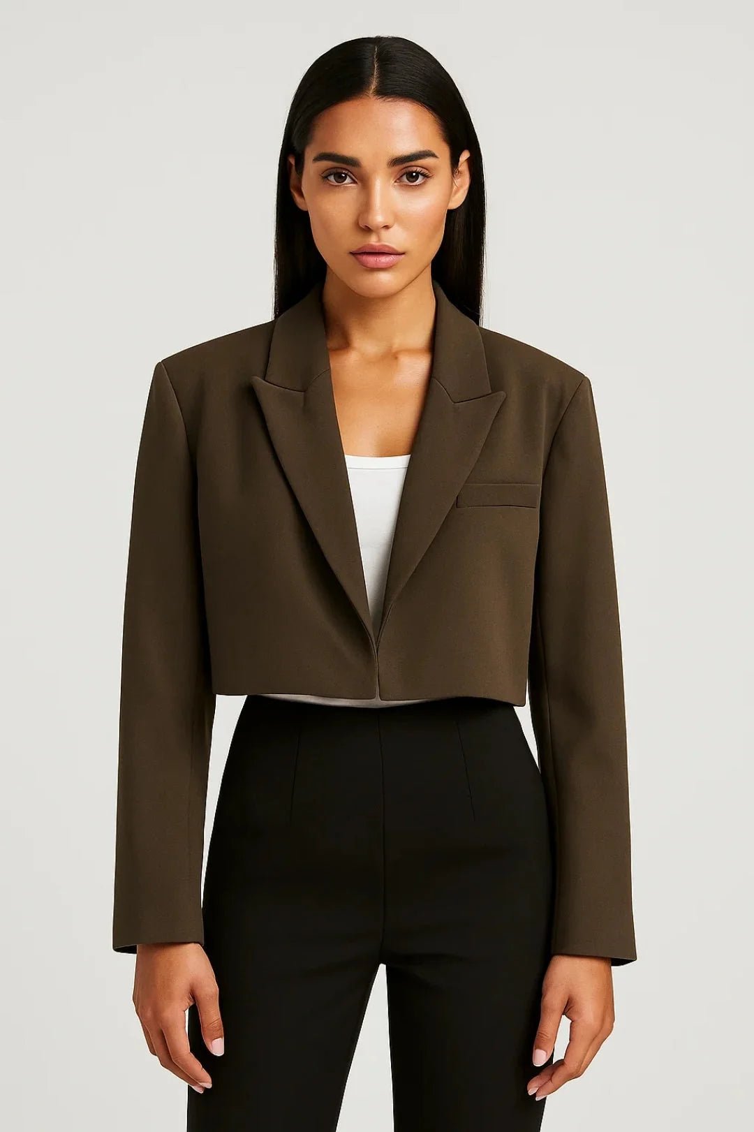 Cropped tailored blazer with classic lapel collar, perfect for versatile business casual looks, made from a stylish fabric blend. 3