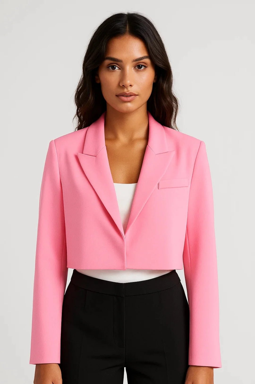 Cropped tailored blazer with classic lapel collar, perfect for versatile business casual looks, made from a stylish fabric blend. 0