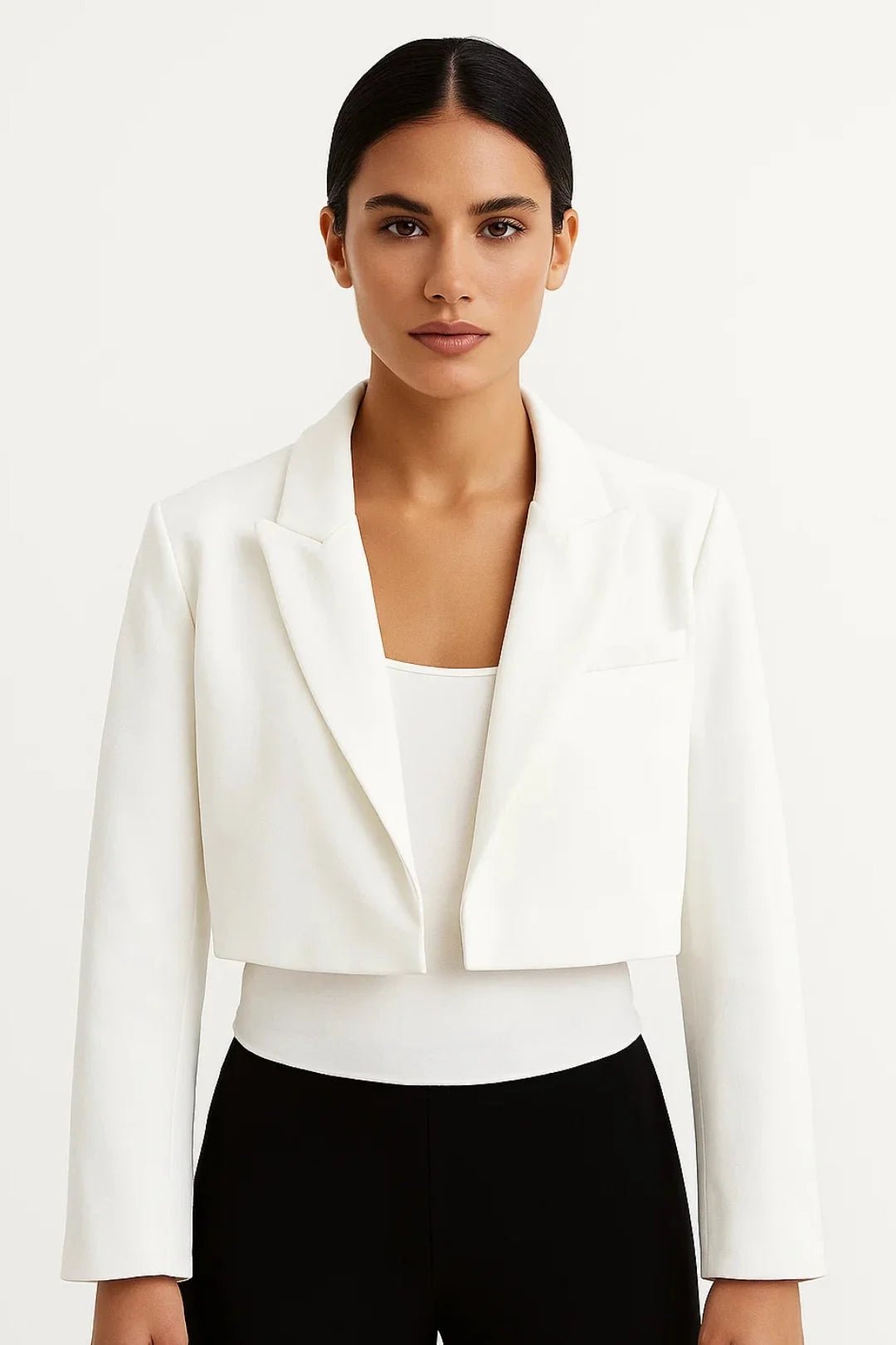 Cropped tailored blazer with classic lapel collar, perfect for versatile business casual looks, made from a stylish fabric blend. 4