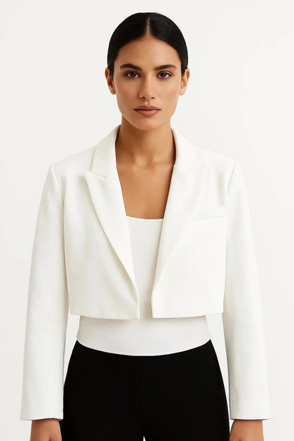 Cropped tailored blazer with classic lapel collar, perfect for versatile business casual looks, made from a stylish fabric blend. 4