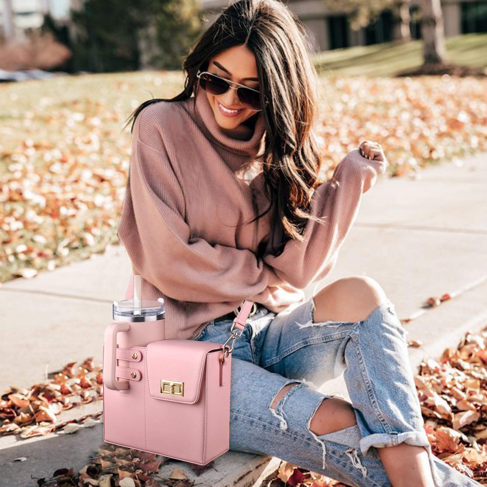 Black crossbody bag featuring a stylish leather and nylon design, equipped with a convenient bottle holder, perfect for women on the go. 0
