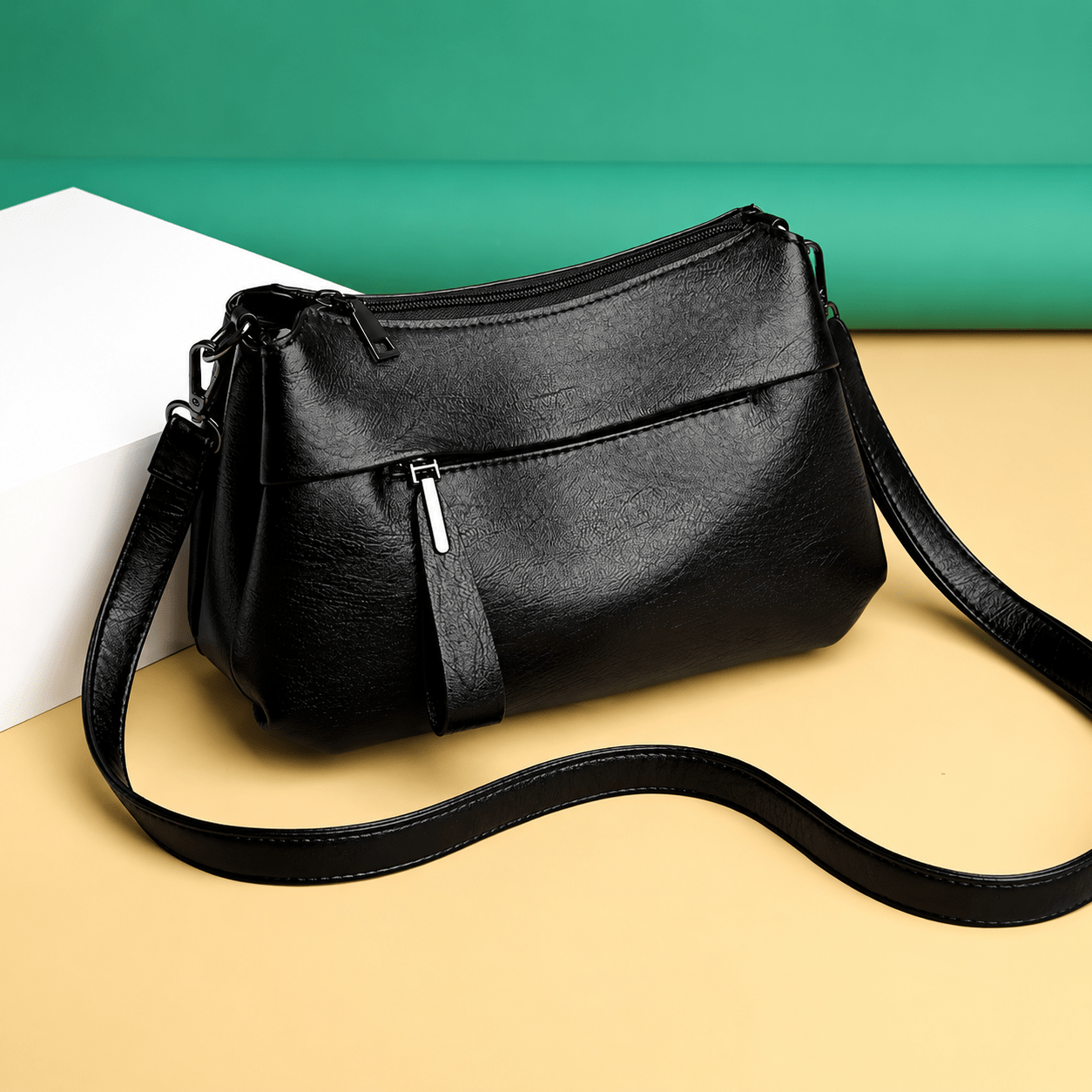 Lightweight crossbody bag for women featuring smart compartments and an adjustable strap, perfect for everyday use. 2