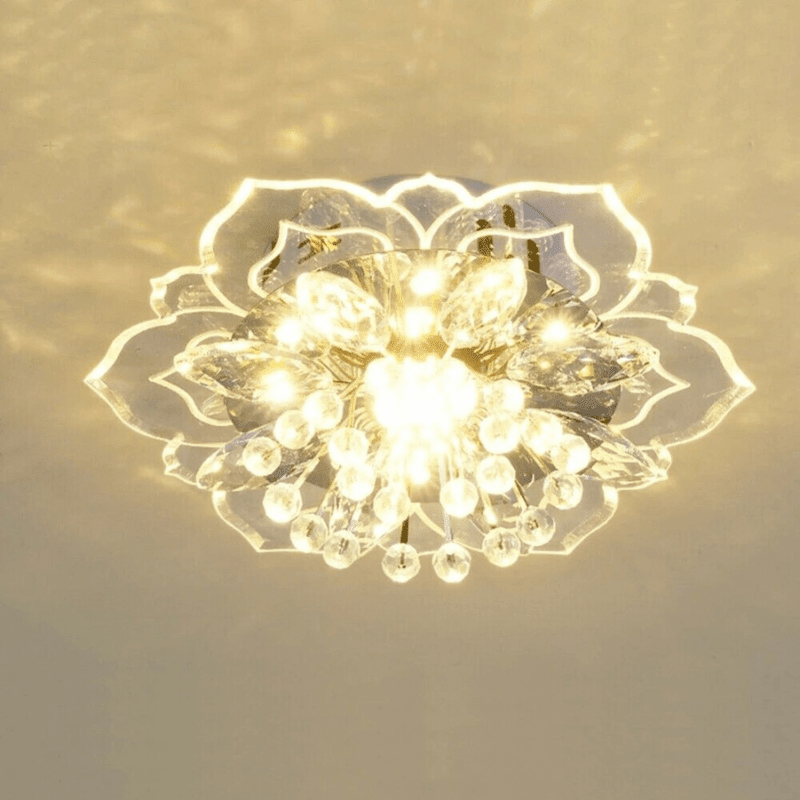 Elegant crystal chandelier featuring a modern flower design with gold accents and built-in LED lights, perfect for enhancing the ambiance of any room. 4