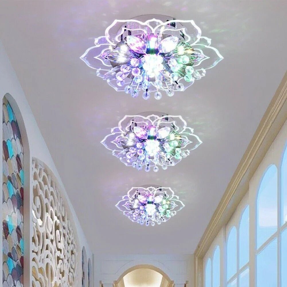 Elegant crystal chandelier featuring a modern flower design with gold accents and built-in LED lights, perfect for enhancing the ambiance of any room. 2