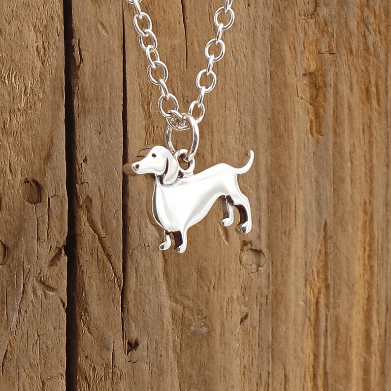 Charming Dachshund silver necklace with adjustable chain, perfect for dog lovers and pet enthusiasts. 1