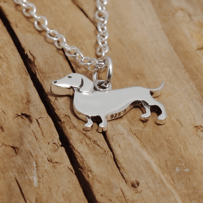 Charming Dachshund silver necklace with adjustable chain, perfect for dog lovers and pet enthusiasts. 0