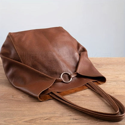 Dark brown leather tote bag featuring a secure buckle closure, perfect for versatile shoulder and sling use, ideal for everyday style and functionality. 7