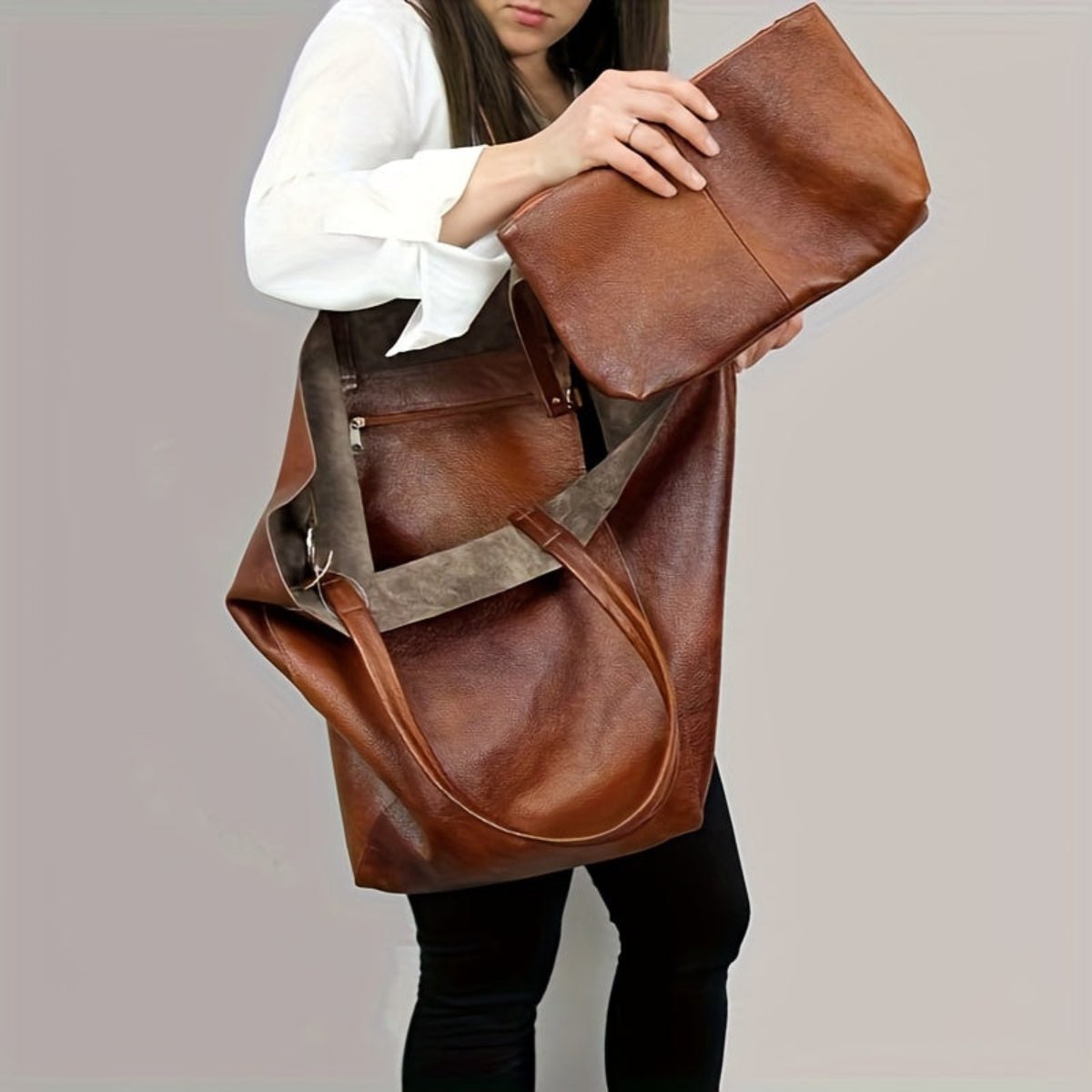 Dark brown leather tote bag featuring a secure buckle closure, perfect for versatile shoulder and sling use, ideal for everyday style and functionality. 6