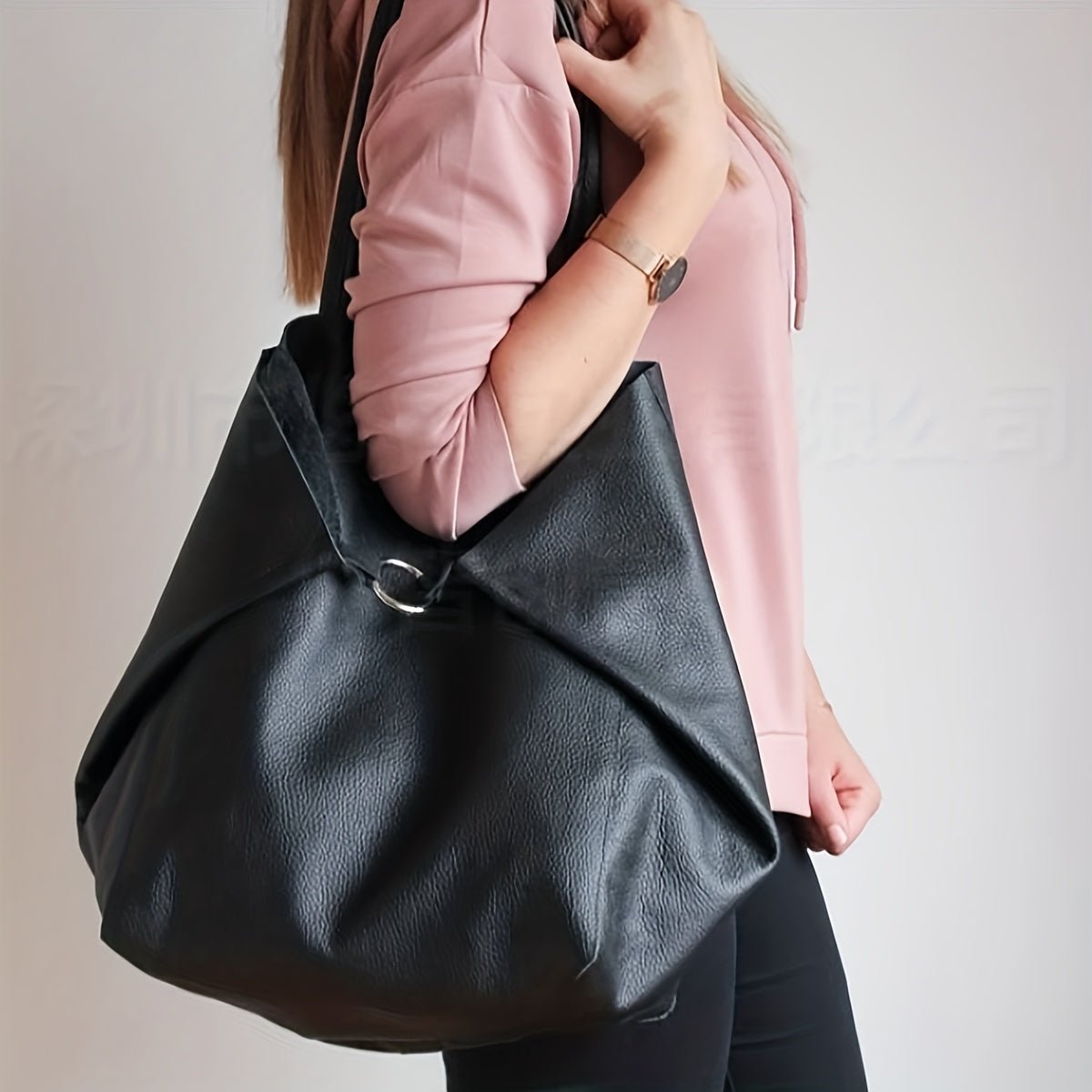 Dark brown leather tote bag featuring a secure buckle closure, perfect for versatile shoulder and sling use, ideal for everyday style and functionality. 4