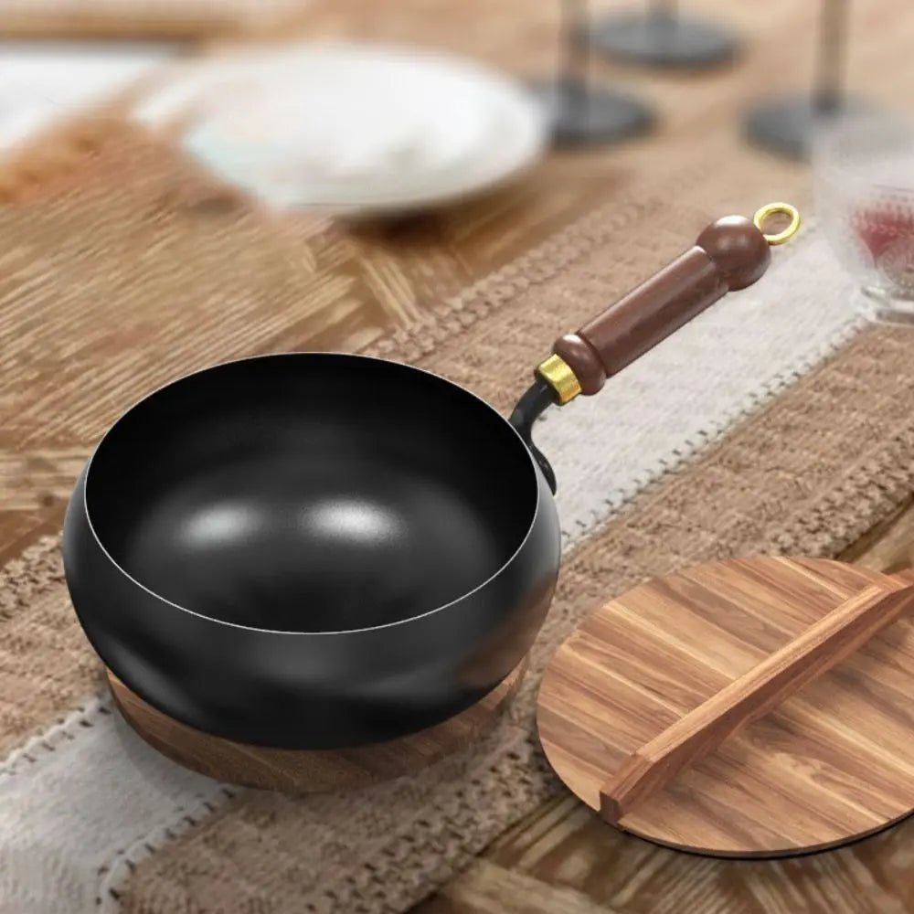 Deep Iron Wok Pan with Lid featuring a non-stick surface, ideal for induction cooking and versatile meal preparation, showcasing its sleek design and functionality. 3
