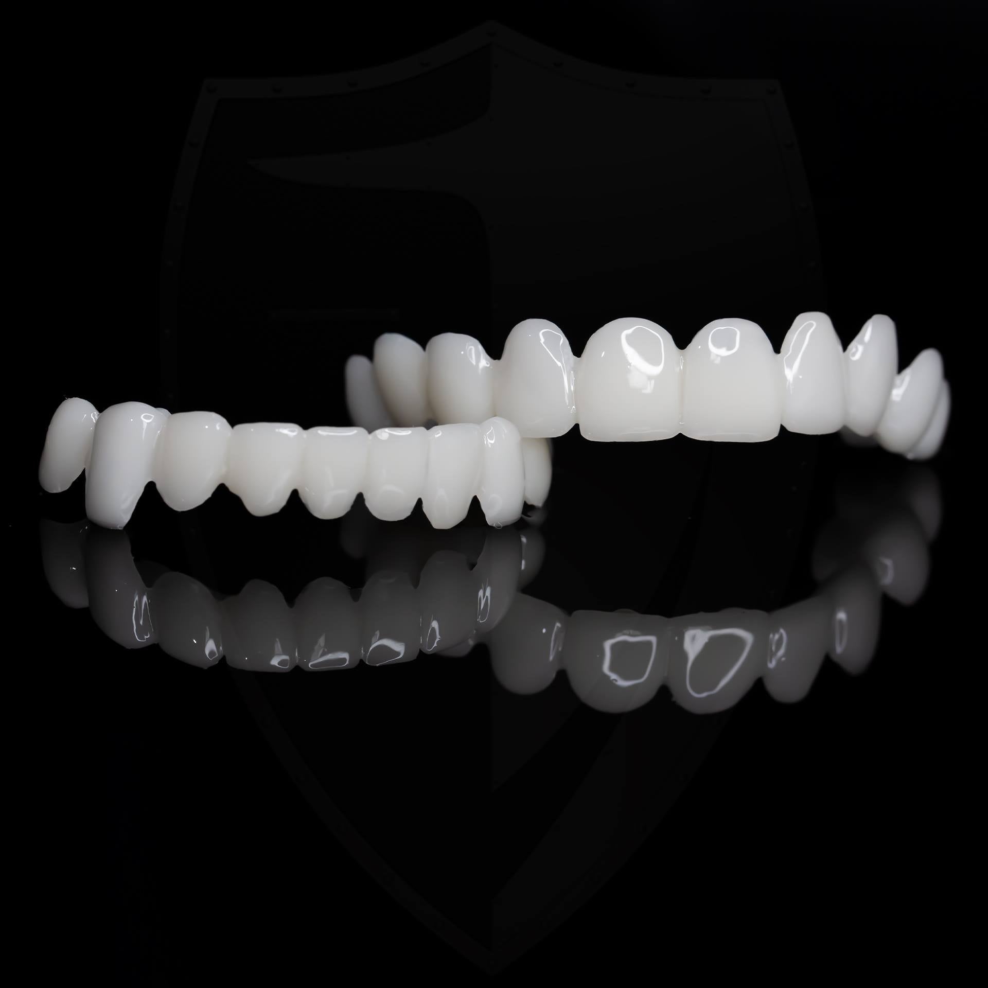 Dental veneers made from flexible, high-quality resin, designed for a natural appearance and comfortable wear, ideal for enhancing smiles. 8