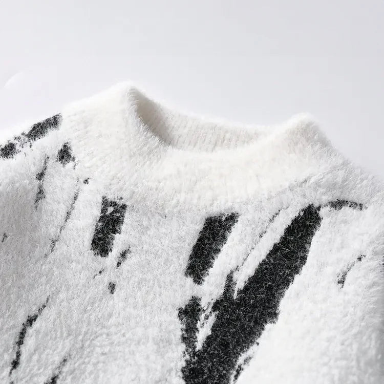 Designer sweater featuring a stylish abstract pattern, crafted from warm knit fabric, suitable for both men and women, showcasing a modern style perfect for any casual or 2