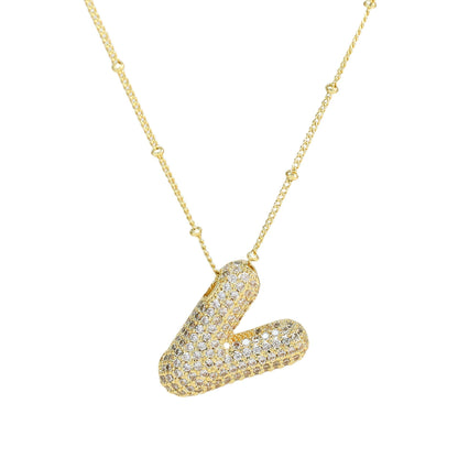 Personalized diamond initial necklace featuring bubble diamonds, elegant 50cm (20in) design, perfect for special occasions and gifts. 45