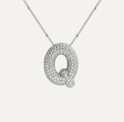 Personalized diamond initial necklace featuring bubble diamonds, elegant 50cm (20in) design, perfect for special occasions and gifts. 47