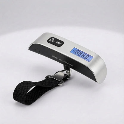 Digital luggage scale with backlit LCD display and ergonomic rubber handle, designed for portable travel with a maximum capacity of 50 kg. 8