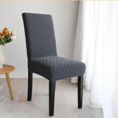 Set of stretchable and washable dining chair covers made from durable polyester fabric, designed to protect and enhance the look of dining room chairs, easy to install 1