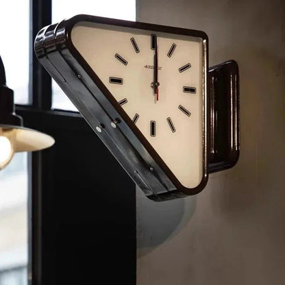 Double-sided wall clock with a sleek metal frame, featuring a modern minimalist design ideal for corner spaces, measuring 33cm x 28cm. 2