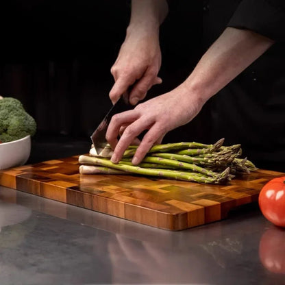 Double-sided wooden cutting board featuring drainage grooves, ideal for meal prep and versatile kitchen use. 3