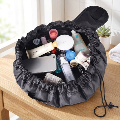 Drawstring Cosmetics Organizer in black featuring a spacious design and quick access compartments for easy storage and organization of beauty products. 0