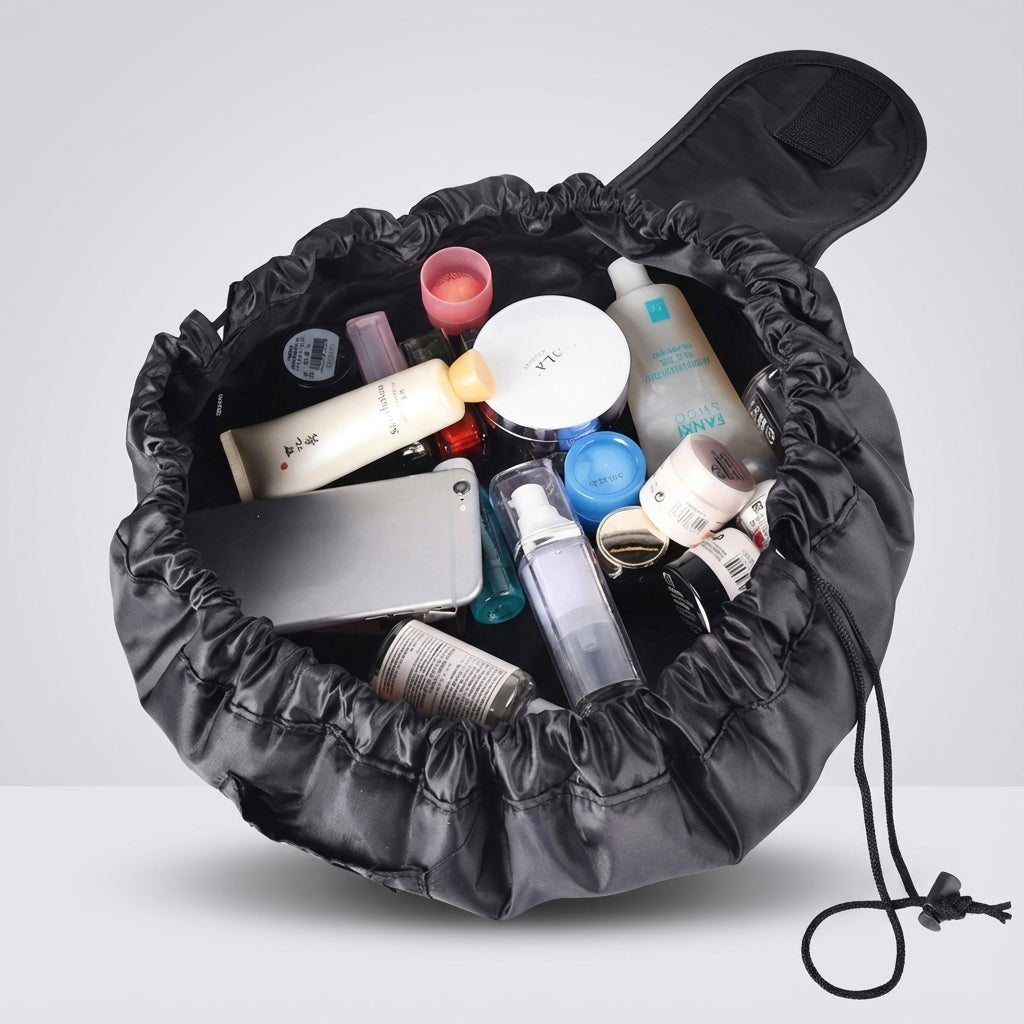 Drawstring Cosmetics Organizer in black featuring a spacious design and quick access compartments for easy storage and organization of beauty products. 1