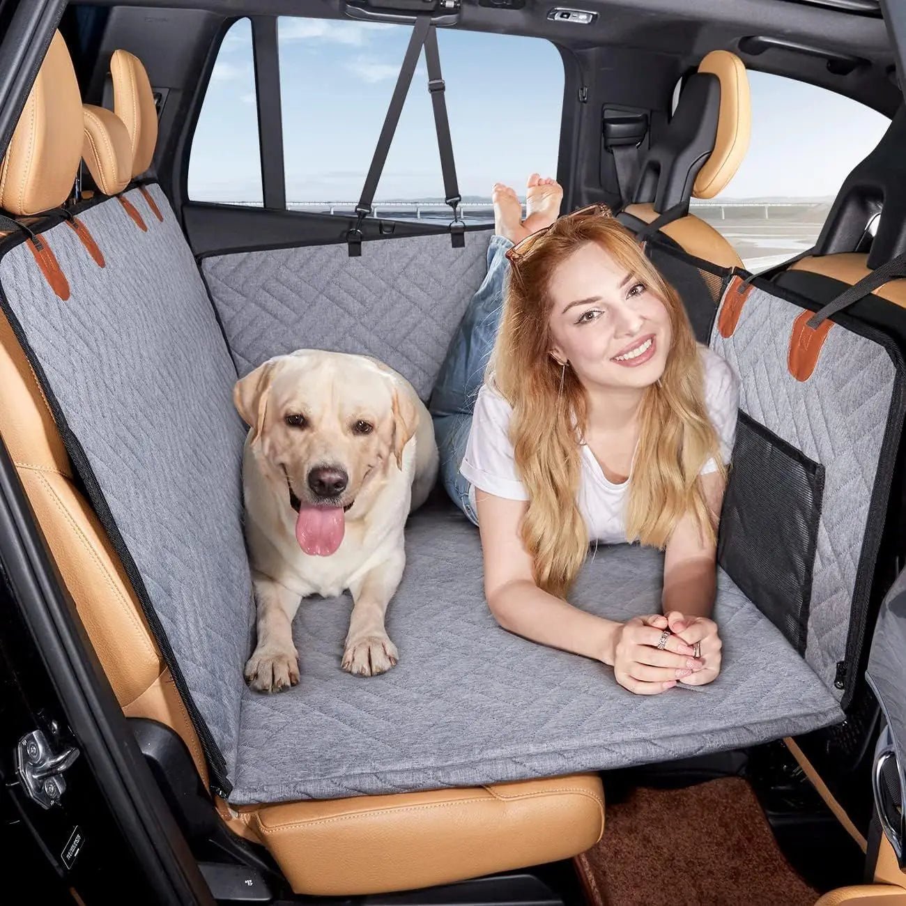 Durable dog car hammock for back seat, featuring universal fit, easy installation, and upholstery protection, providing a comfortable travel space for pets. 1