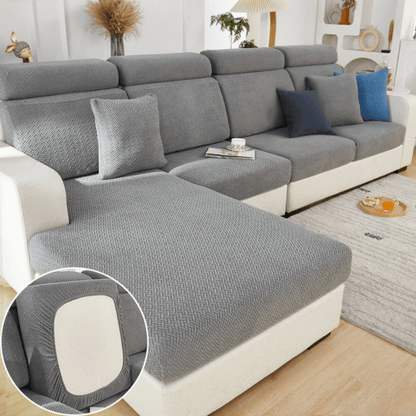 Elastic sofa cover designed for loose cushions, featuring stretch jacquard fabric for a snug fit, ideal for pet protection and easy machine washing. 0
