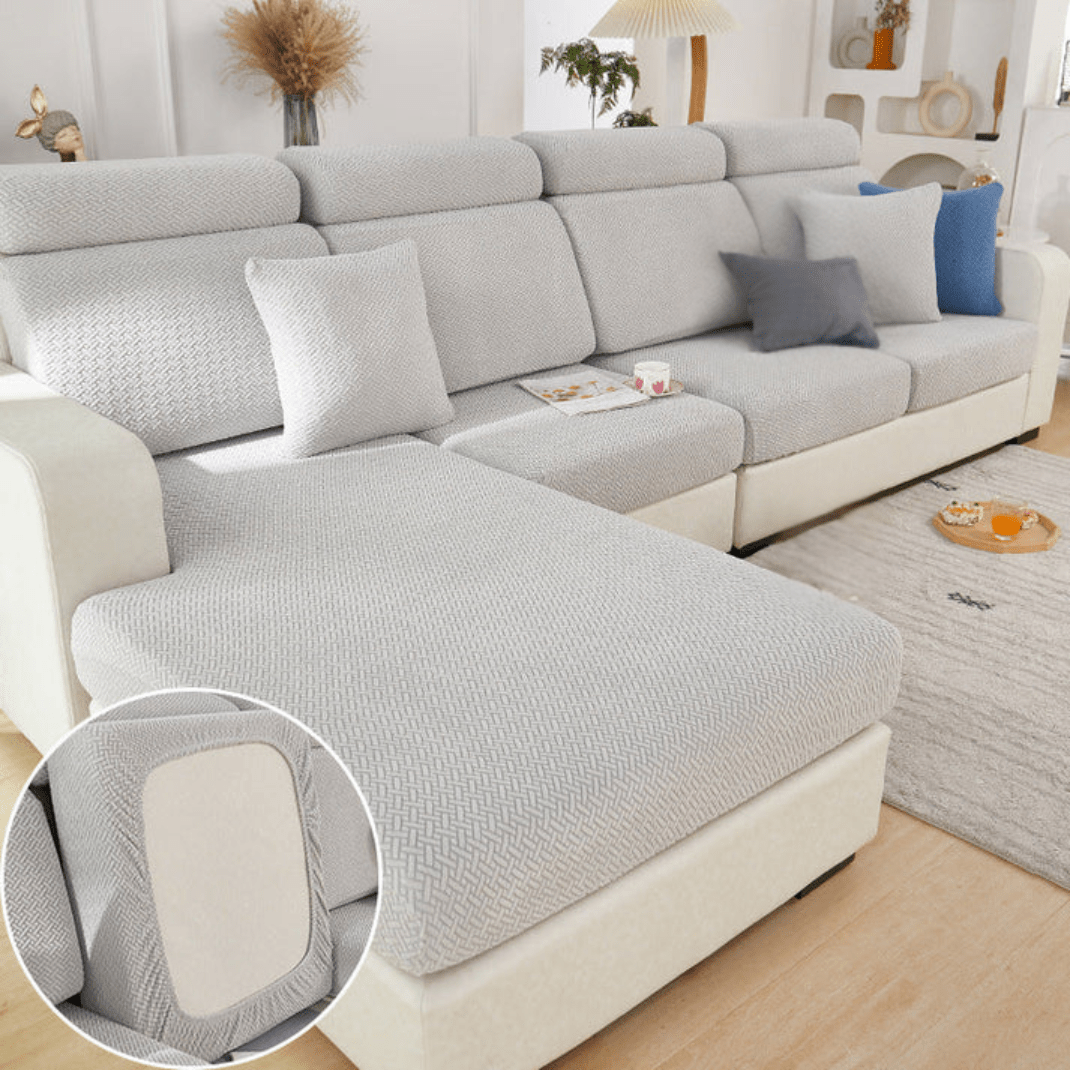 Elastic sofa cover designed for loose cushions, featuring stretch jacquard fabric for a snug fit, ideal for pet protection and easy machine washing. 2