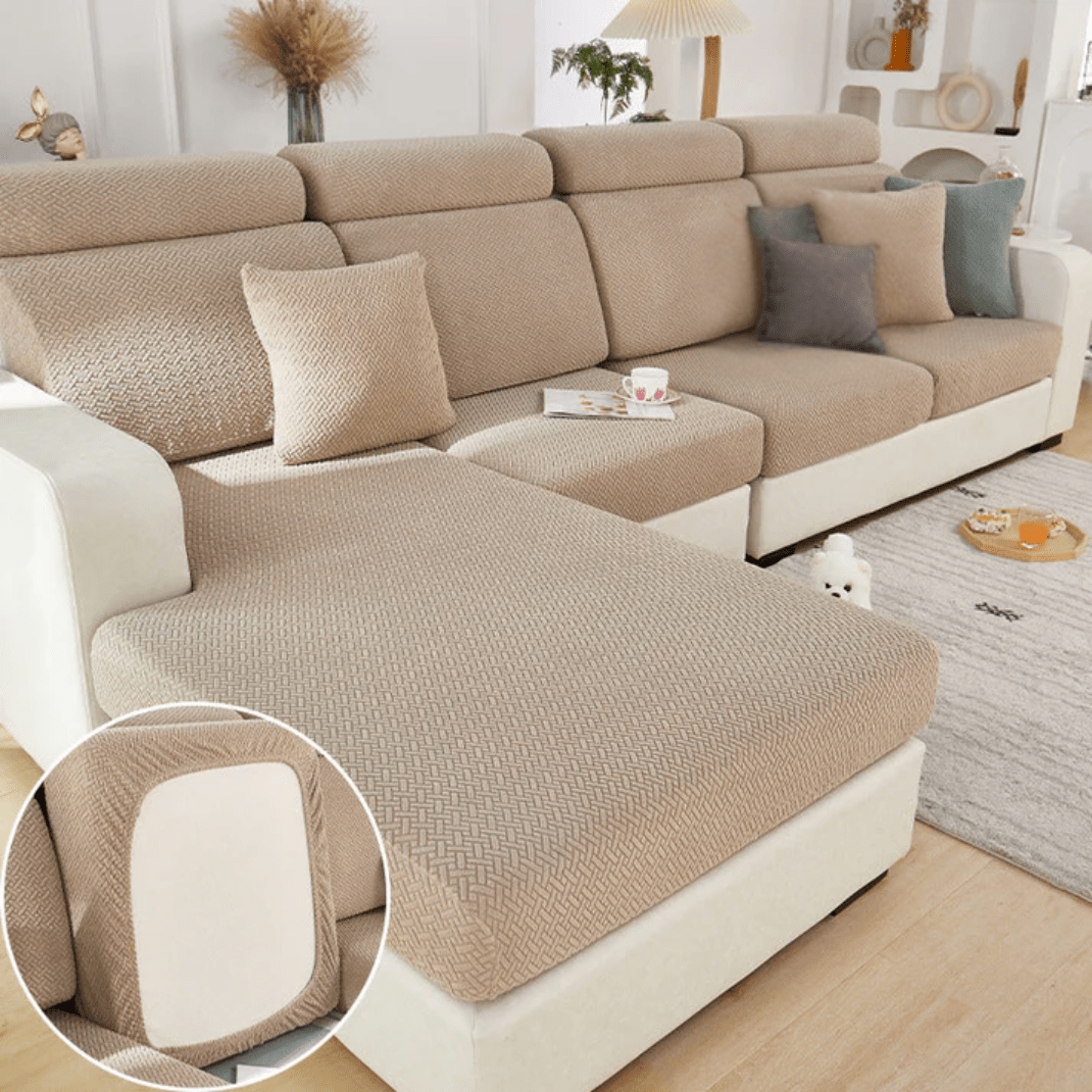 Elastic sofa cover designed for loose cushions, featuring stretch jacquard fabric for a snug fit, ideal for pet protection and easy machine washing. 1